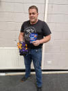 May be an image of 1 person, tool bag, toy and text